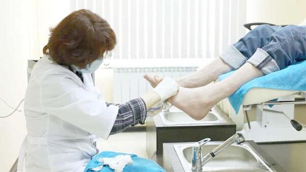 A dermatologist treats toenail fungus. 